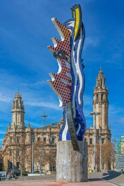 Barcelona, Spain - March 1, 2022: El Cap de Barcelona (The Head of Barcelona) a sculpture of 19,5 m (an abstract rendition of a woman's head) by artist Roy Lichtenstein for the 1992 Summer Olympics. 