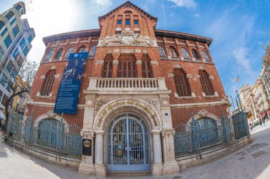 VALENCIA, SPAIN - MARCH 29, 2022:  Fundacin Mediterrneo-La Llotgeta Centre Fotografic located in the Plaza del Mercado.Valencian modernism. Construction began in the 1900s, and it opened in 1928.