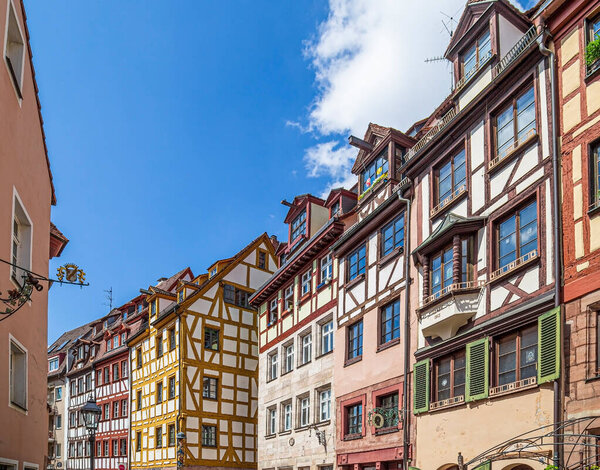 NUREMBERG, GERMANY - APRIL 30, 2023: Weissgerbergasse, a street with 22 medieval half-timbered old houses. Is one of the few best preserved street from old craftsman's quarter, in today's old town.