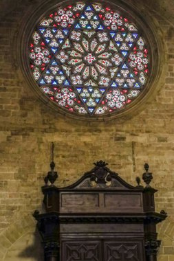 VALENCIA, SPAIN - MARCH 28, 2022: Interior of Valencia Cathedral, St Mary's Cathedral, a Roman Catholic church in Valencian Gothic architectural style. Consecrated in 1238 and groundbreaking in 1262.