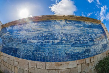 Mirador de Santa Lucia, Alfama district, Lisbon, Portugal. Tile Azulejos panel depicting a drawing of the Praa do Comrcio as it was in 1718, before it was destroyed in the earthquake of 1755. clipart