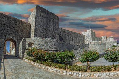 Dubrovnik, Croatia.The Revelin bridge and the Walls of the old city, outside the Ploce Gate. Built between the 13th and 17th centuries, stretch for 1,940 meters and reach up to 25 meters in height. clipart