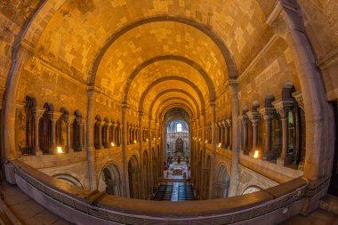 LISBON, PORTUGAL - APRIL 8, 2024: Interior of the Lisbon Cathedral, also known as the Cathedral of Saint Mary Major or Se de Lisboa. Is the oldest church in Lisbon and it was originally built in 1147. clipart