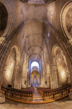 PORTO, PORTUGAL - APRIL 12, 2024: Interior of Porto Cathedral (Se do Porto). Start of construction on 12th century (cathedral), 16th century (cloister) and 17th century (chancel). clipart