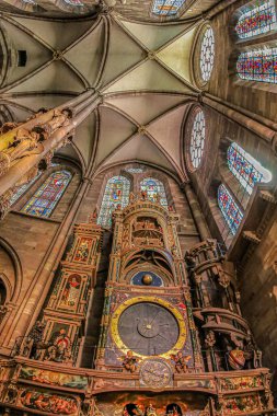 STRASBOURG, FRANCE- MAY 3, 2023: Detail of the famous astronomical clock inside Notre-Dame de Strasbourg Cathedral which dates from the time of the first French possession of the city (1681-1870). clipart