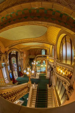 BARCELONA, CATALONIA, SPAIN - APRIL 14, 2024: Staircase of Palace of Catalan Music, a concert hall designed in the Catalan modernist style by the architect Lluis Domenech i Montaner. Built 1905-1908. clipart