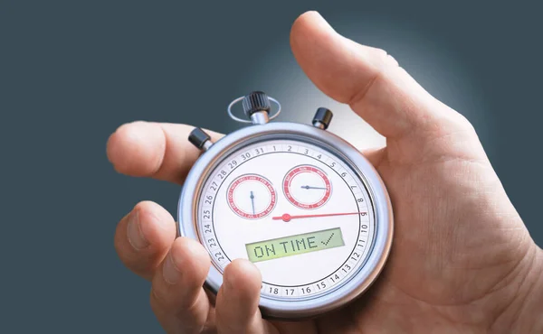 Hand holding a conceptual stopwatch with the text on time. Delivery time concept. Just in time logistics.