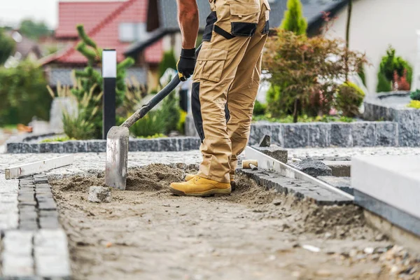 Professional Construction Worker Evenly Spreading Sand Shovel Laying Paving Bricks — Stock Photo, Image