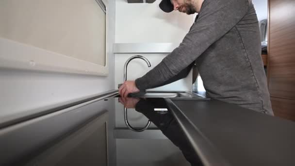 Caucasian Men Cleaning Motorhome Camper Van Kitchen Area Soft Cloth — Αρχείο Βίντεο