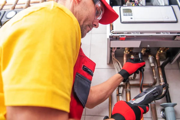 Professional Caucasian Plumber Checking Water Heater Gas Pressure Make Sure — Stock Photo, Image