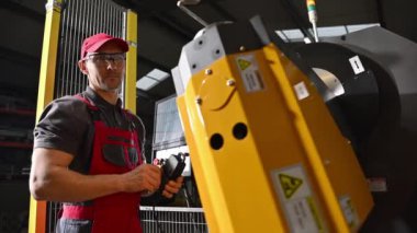 Wire Banding Machine Operator. Modern Metalworking Industry Machine.