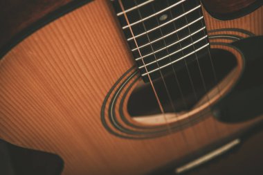 Closeup of Classical Acoustic Guitar Strings. Music and Musical Instruments Theme.