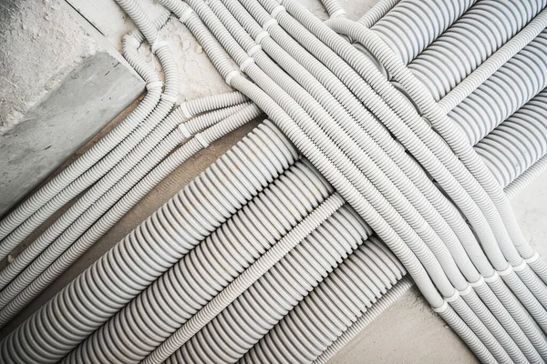 Plastic Electric System Conduits Installed Floor Industrial Theme — Stock Photo, Image