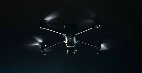 Modern Drone in Flight. Night Time Low Light Scenery. Aerial Technologies.