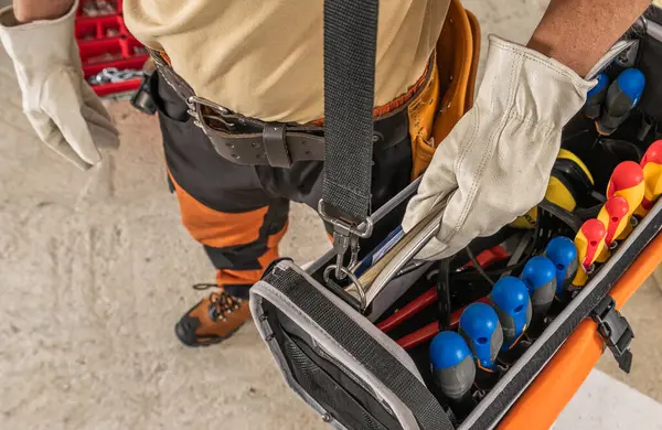 Construction Worker Moving Tool Box Hanged His Shoulder Stock Image