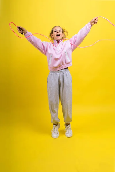 Adorable Female Child Skipping Rope Jumping Studio — Stockfoto