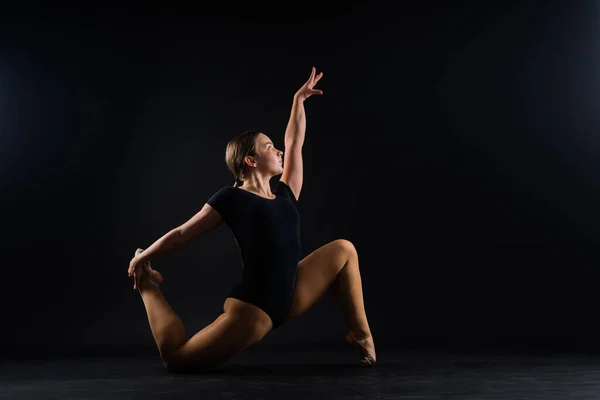 Flexible Girl Rhythmic Gymnastic Artist Jumping White Dark Background Grace — Stock Photo, Image