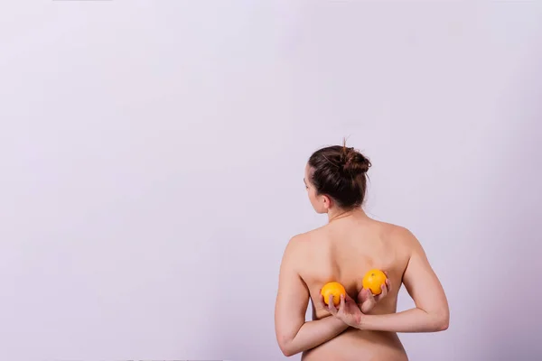 Slim Woman Holding Orange Perfect Female Back Any Cellulite — Stock fotografie