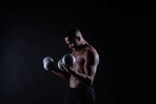 Isolated African Muscular Man Dumbbells Dark Studio Background Strong Shirtless — 图库照片