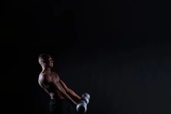 Isolated African Muscular Man Dumbbells Dark Studio Background Strong Shirtless — Foto Stock