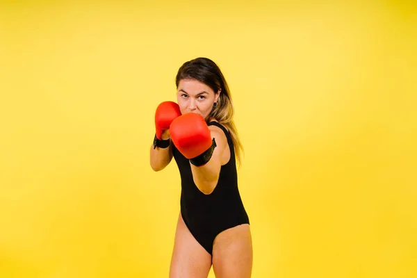 Woman Boxer Gloves Training Black Red Yellow Background — Stok fotoğraf