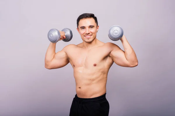 Shirtless Bodybuilder Showing His Great Body Holding Dumbells —  Fotos de Stock