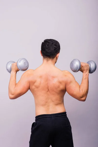 Shirtless Bodybuilder Showing His Great Body Holding Dumbells — Stockfoto