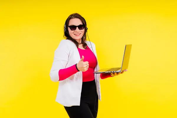 stock image Young fat plus size woman hold a laptop pc computer. Body positive concept