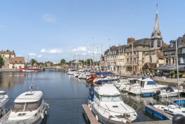 City view around the port of Honfleur, a commune in the Calvados department in northwestern France clipart