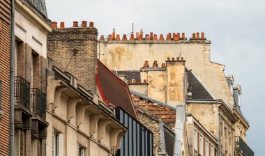 Architectural detail including some chimneys seen in Reims, the most populous city in the French department of Marne clipart