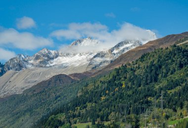 Scenery around the Saint-Gotthard Massif, a mountain range in the Alps in Switzerland clipart