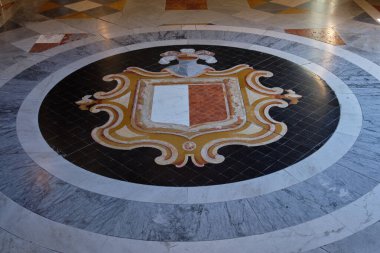 Mosaic floor decoration with a coat of arms in the  Grand Master's Palace - Valletta, Malta