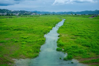 İtalya 'nın Vicenza ilindeki Trissino ve Arzignano belediyelerindeki Agno Gua nehri üzerindeki sel koruma ve hidrolik ve ıslah projeleri için nehir mühendisliği çalışmaktadır..