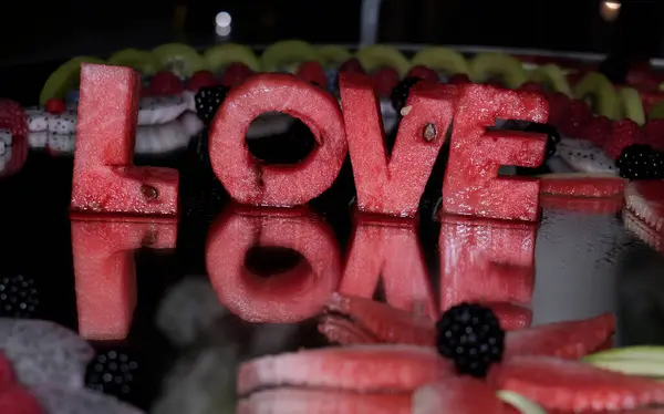 stock image Watermelon carved into the word love