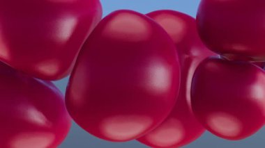 Kapalı bir alana sığmaya çalışan balonların 3 boyutlu olarak şişirilmesi tuhaf ama gergin bir sahne yaratıyor..