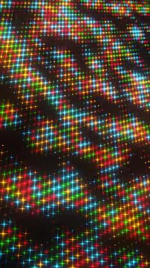 Parlayan turuncu noktalı soyut dijital desen dinamik bir doku oluşturuyor.