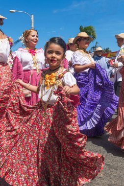 Las Tablas, Panama - January 11, 2023: People parading and performing at 1000 Polleras Parade, known as the 'Desfile De Las Mill Polleras' in Las Tablas, Panama.