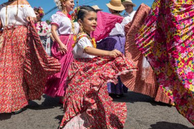 Las Tablas, Panama - January 11, 2023: People parading and performing at 1000 Polleras Parade, known as the 'Desfile De Las Mill Polleras' in Las Tablas, Panama.