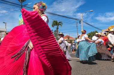 Las Tablas, Panama - January 11, 2023: People parading and performing at 1000 Polleras Parade, known as the 'Desfile De Las Mill Polleras' in Las Tablas, Panama.