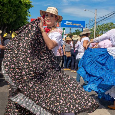 Las Tablas, Panama - January 11, 2023: People parading and performing at 1000 Polleras Parade, known as the 'Desfile De Las Mill Polleras' in Las Tablas, Panama.