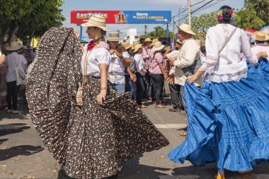 Las Tablas, Panama - January 11, 2023: People parading and performing at 1000 Polleras Parade, known as the 'Desfile De Las Mill Polleras' in Las Tablas, Panama.