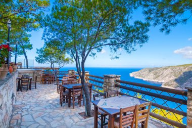 Zakinthos, Greece - 03.09.2022: Romantic terrace at a restaurant on Zakynthos (Ionic Islands, Kampi, Greece)