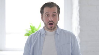 Portrait of Tense Mature Man in Shock