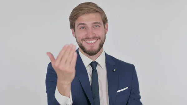 Young Adult Businessman Pointing Camera Inviting White Background — 스톡 사진