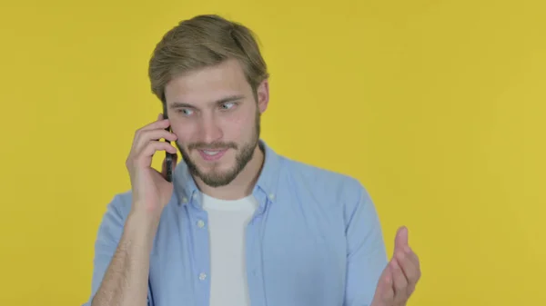 Casual Young Man Talking Angry Phone Yellow Background —  Fotos de Stock