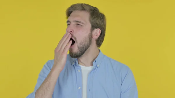 Tired Casual Young Man Yawning Yellow Background — Fotografia de Stock
