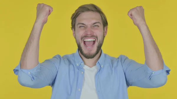 Successful Casual Young Man Celebrating Yellow Background — Photo