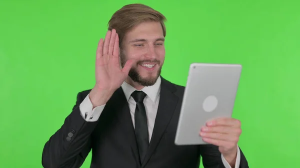 Video Call Tablet Young Adult Businessman Green Background — Fotografia de Stock