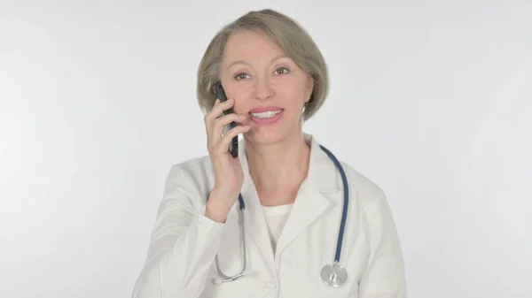Senior Female Doctor Talking Phone White Background — 스톡 사진