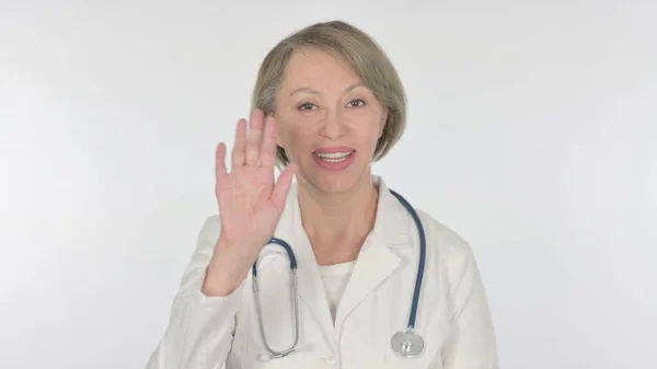Senior Female Doctor Talking Online Video Call White Background — Stock Photo, Image